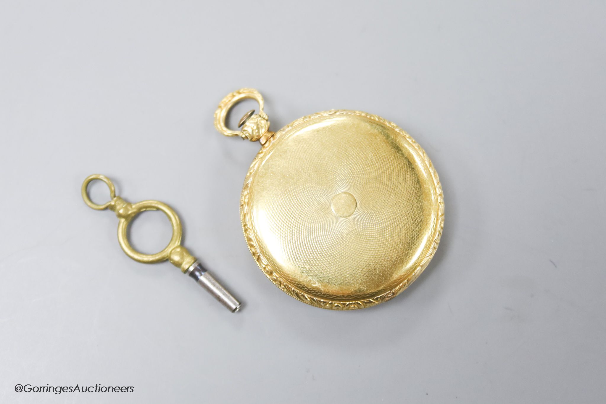 A Swiss cased 19th century engine turned yellow metal open face keywind fob watch, with silvered Roman dial